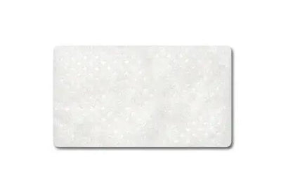 A white, rectangular disposable filter for CPAP machines.